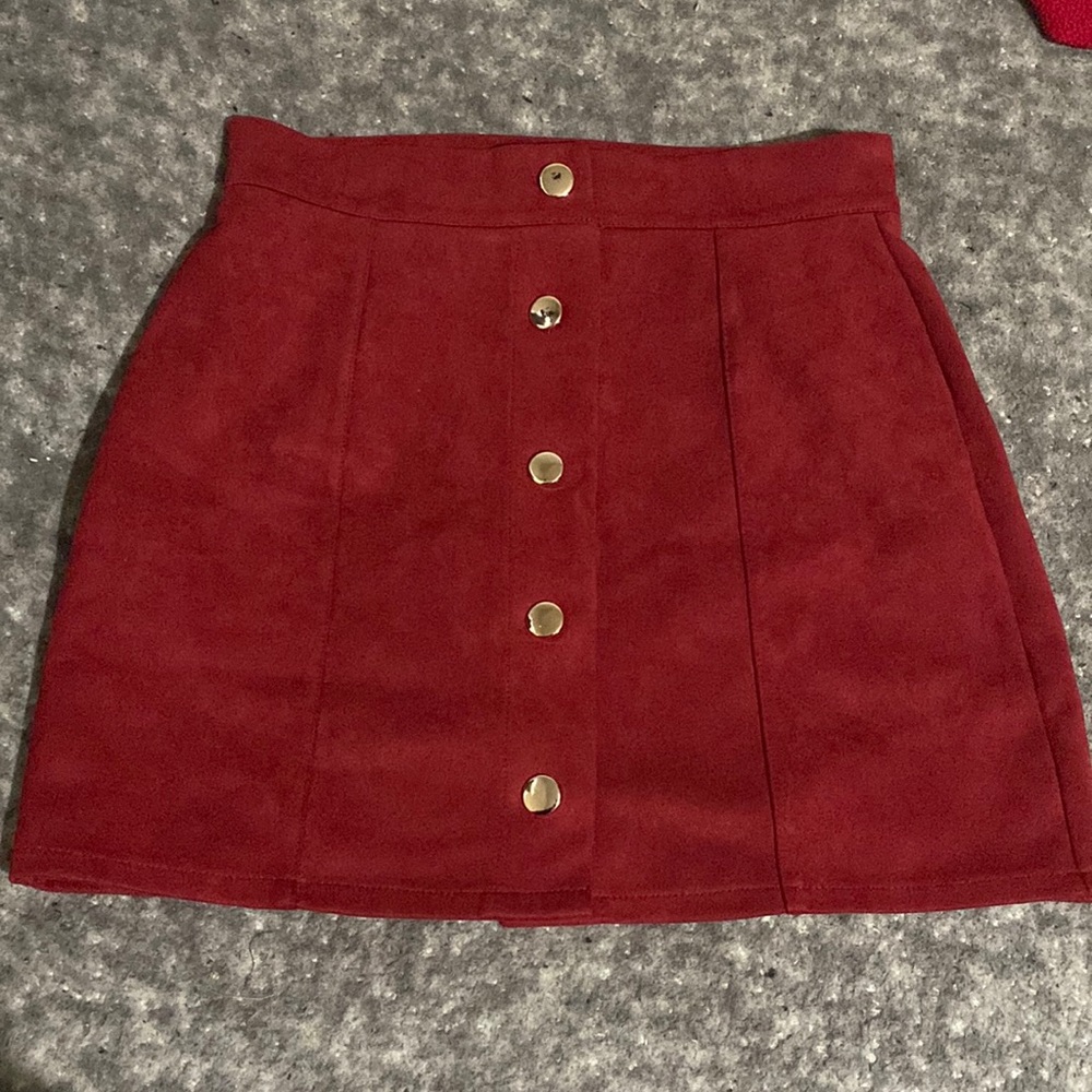 I got this red skirt off the SHEIN app. It doesn’t have a size or brand on it